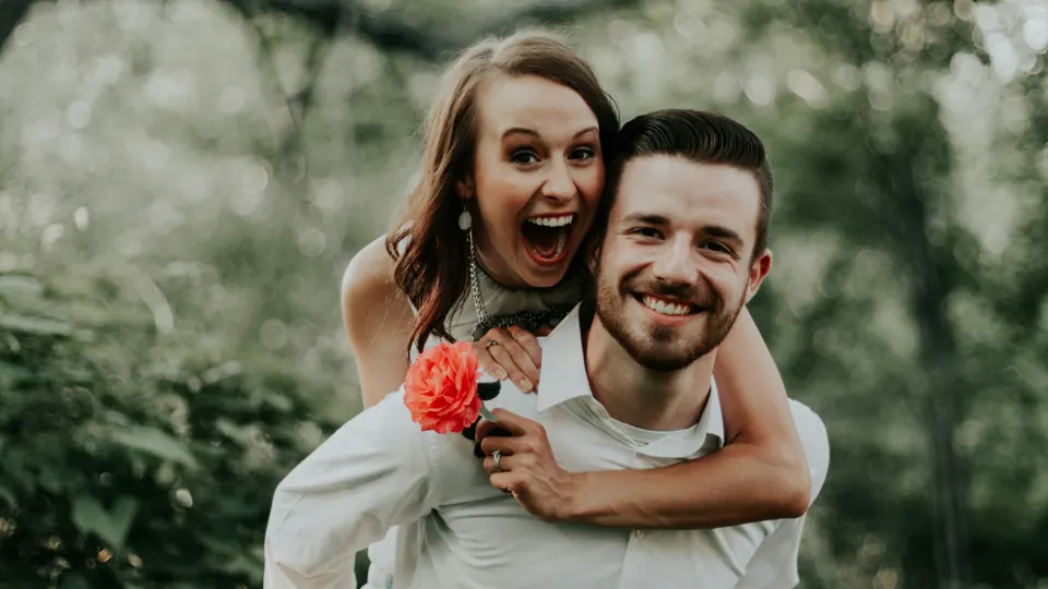 A laughing couple outdoors