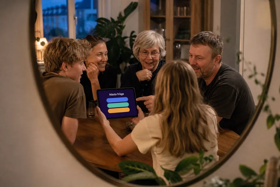 Familj spelar quiz på en surfplatta